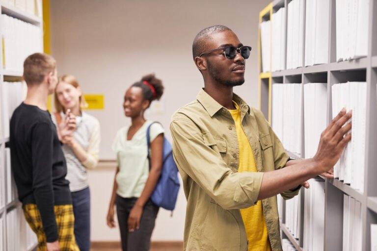 Blind Man in Accessible Library